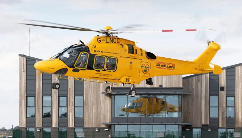 The Lincs & Notts Air Ambulance helicopter landing outside its airbase